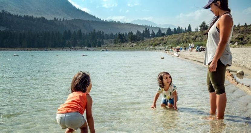 Happy Children Playing on a Sandy Beach